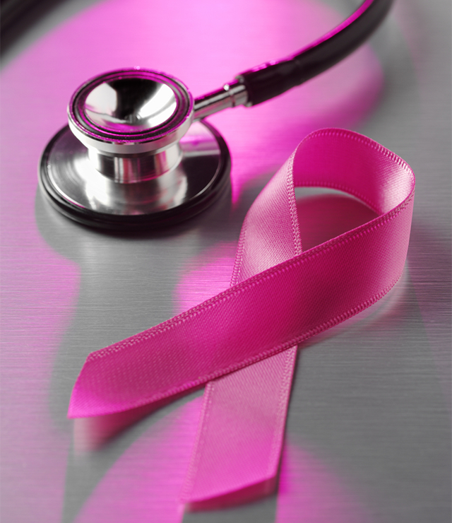 An image of a stethoscope and a cancer awareness ribbon.