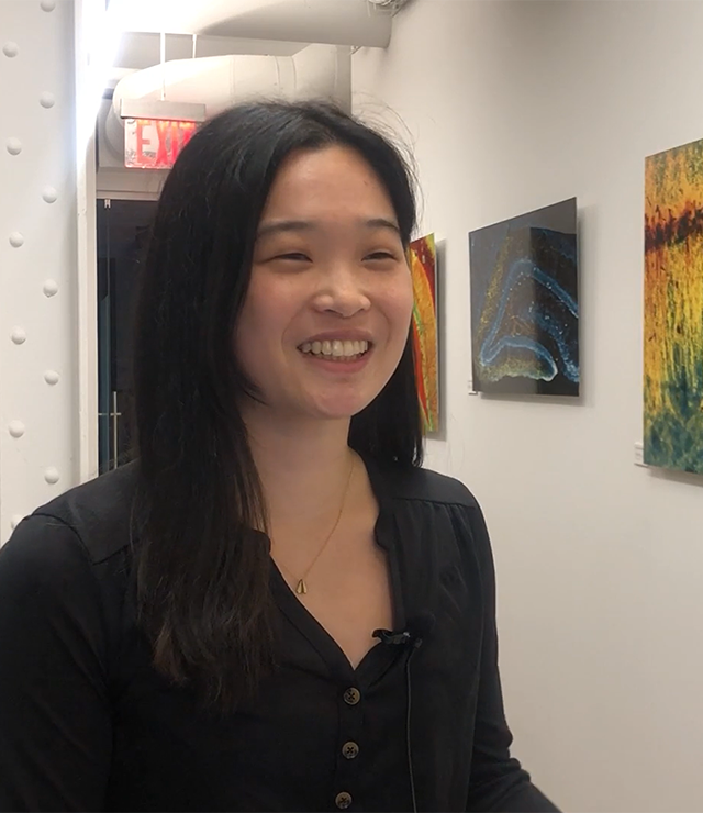 An AI researcher poses for the camera.
