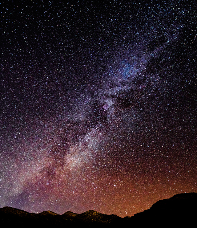 A shot of stars and outer space taken from earth.