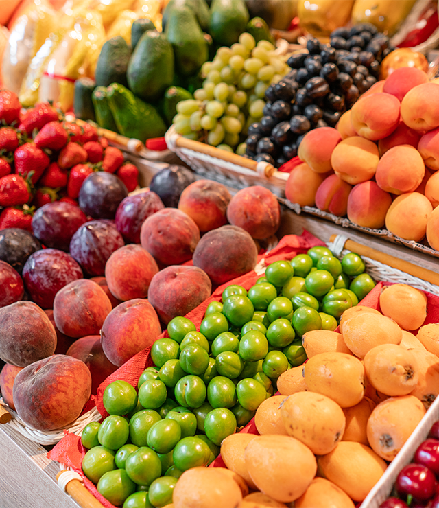 A supermarket display of fresh produce.