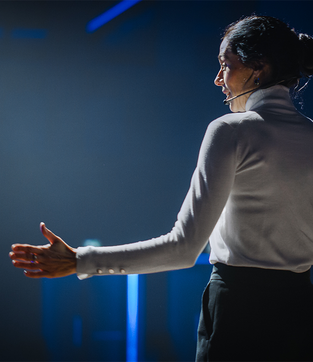 A woman gives a presentation.