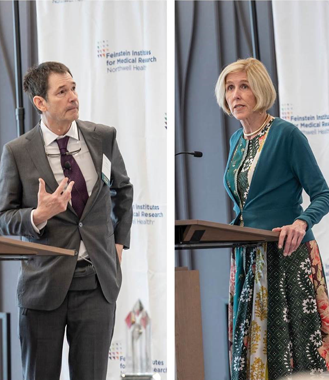 Two researchers stand at podiums and address a crowd.