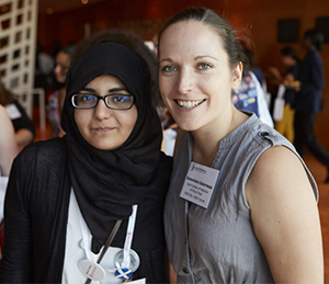 A student poses with her mentor.