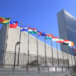 Flags for different countries flying outside of the United Nations.