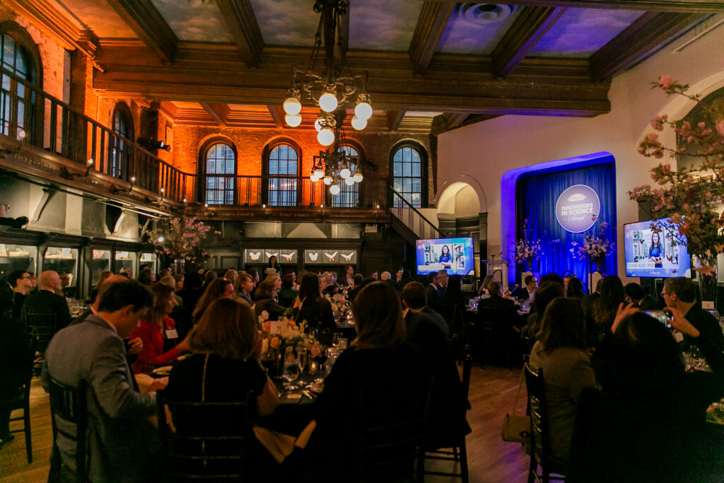 A wide shot of attendees at the 2024 Innovators in Science Award ceremony.
