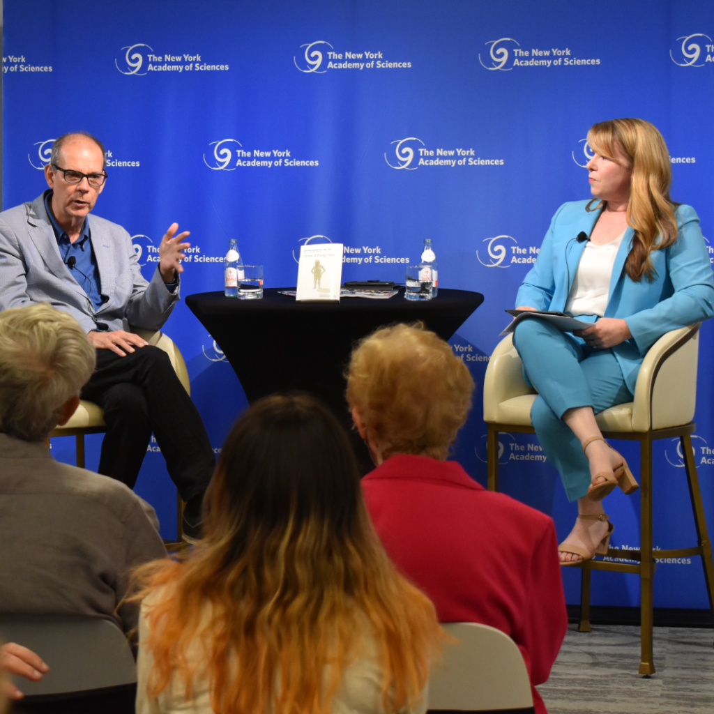 An author discusses his book during an event at the Academy.