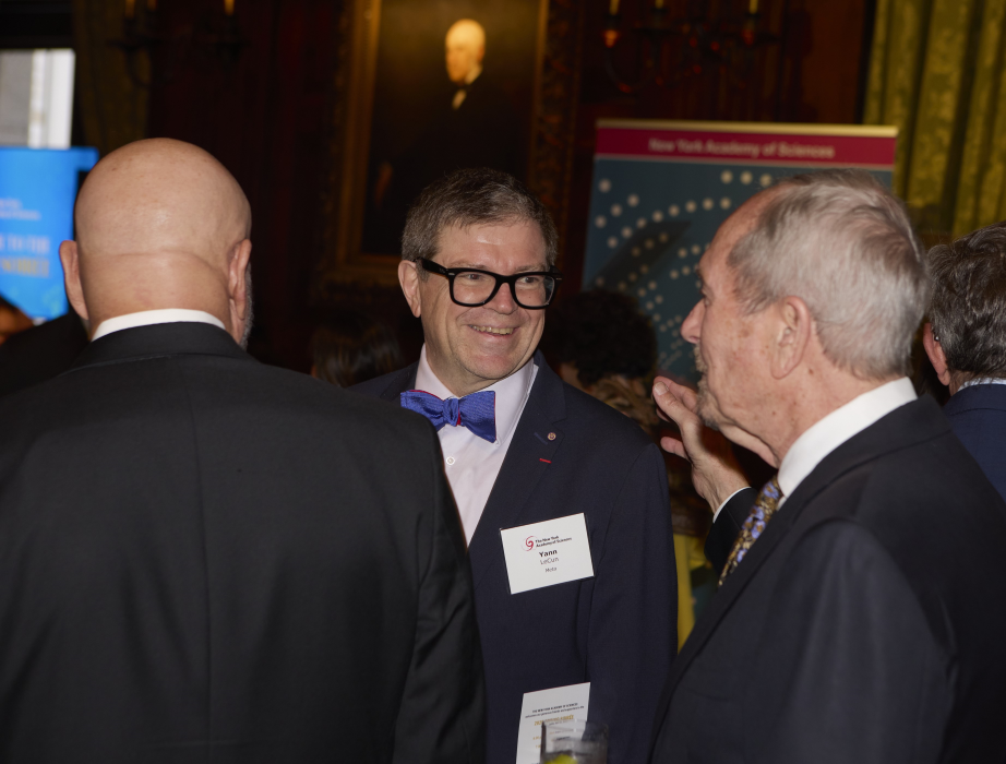 Yann LeCun (center) visits with Hon. Jerry Hultin during the Soirée.