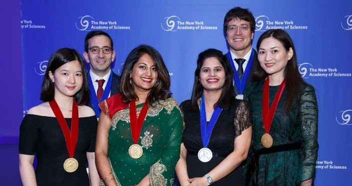 The six honorees pose together.