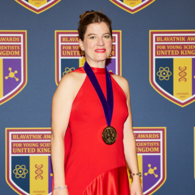 A woman poses for the camera. 