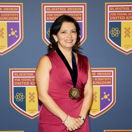 A woman poses for the camera. 