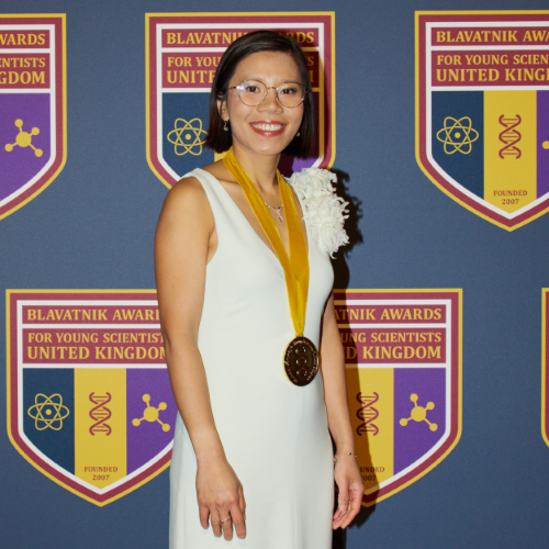 A woman poses for the camera.
