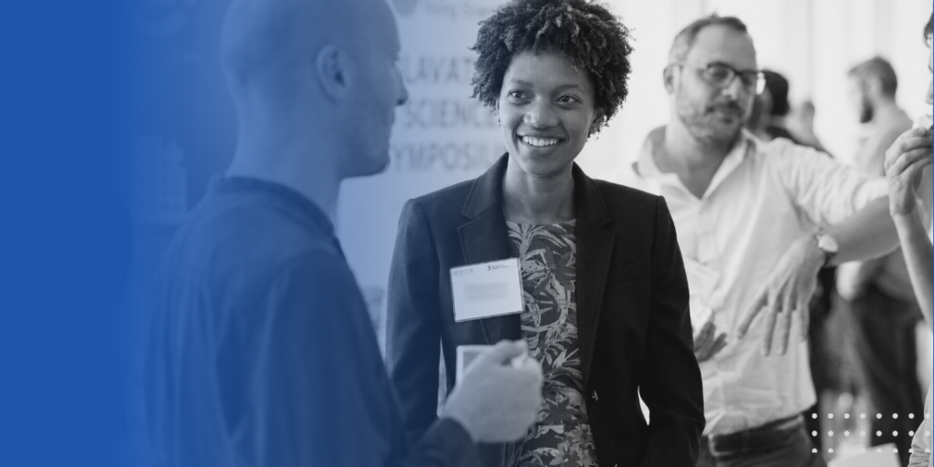 People interact during a networking event.